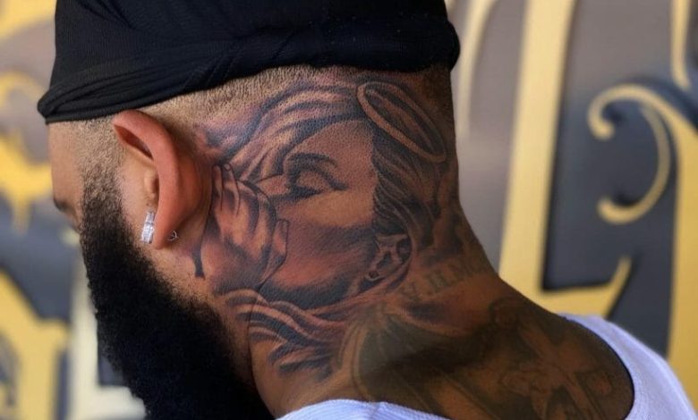 Angel whispering in ear tattoo design