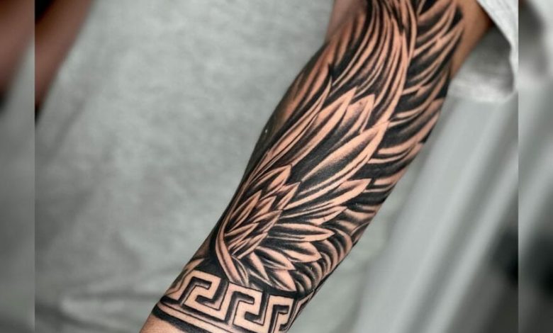 Forearm wing tattoo designs