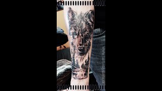 Wolf in forest tattoo design